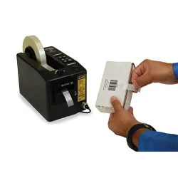 Application du dévidoir automatique ZCM1000 pour la fermeture d'une boite carton avec ruban adhésif