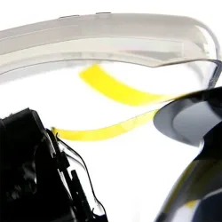 Gros plan du dévidoir électrique automatique TDA025B montrant la coupe du ruban sous capot de sécurité