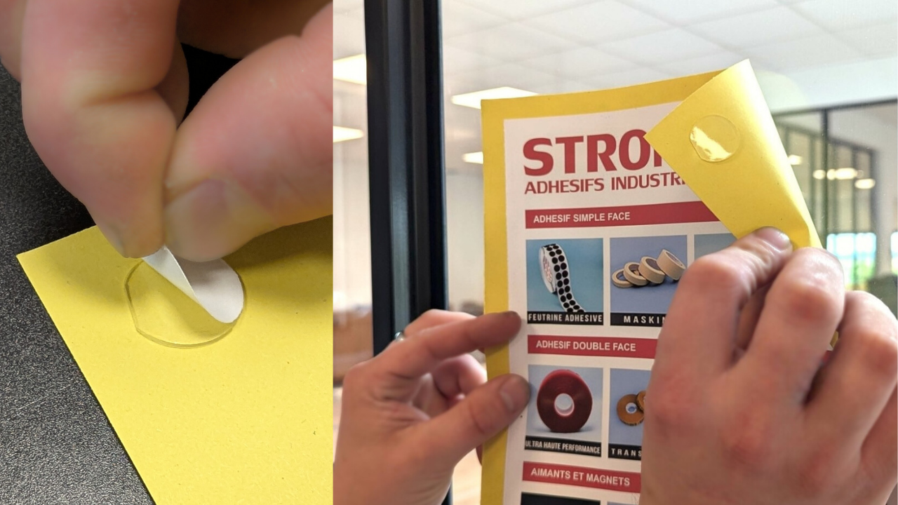 Mains collant une affiche sur une vitrine avec des pastilles autocollantes double face transparentes Strong Adhesifs Industriels